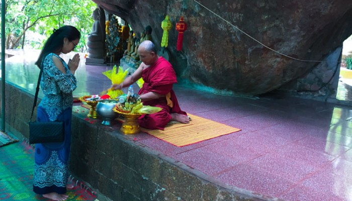 Water blessing from Buddhist monk, Kulen Mountain.