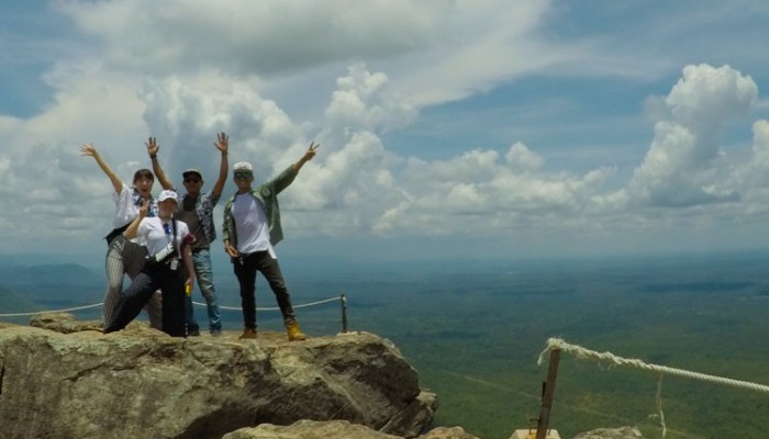 Standing on the cliff of Preah Vihear.