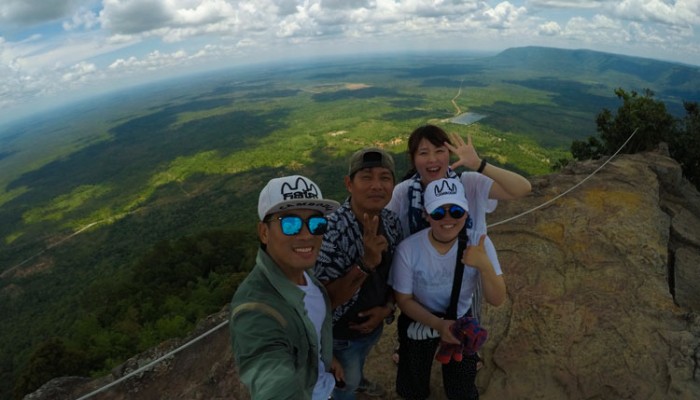 Souvenir selfie photo down to mainland at Peoy Ta Dy cliff,  Preah Vihear temple, Cambodia.